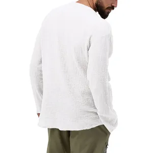 Back view of men's casual white seersucker shirt showing textured long sleeve design