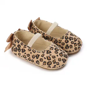 Adorable leopard print baby Mary Jane shoes featuring soft non-slip soles and bow accents.
