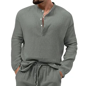 Detailed view of a men's grey-green casual seersucker long-sleeve shirt with henley collar.