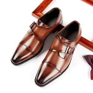 Elegant brown leather monk strap dress shoes for men in a formal business and wedding style