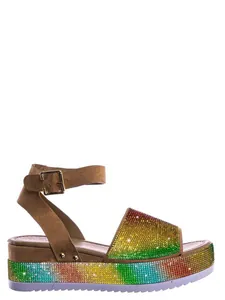 Side view of rainbow rhinestone wedge sandals with a brown suede ankle buckle strap