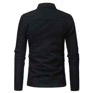 Back view of men's slim fit solid black denim jacket with reinforced stitching
