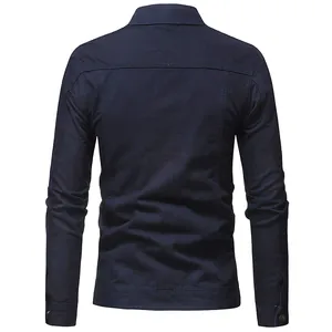 Detailed back view of a navy blue slim-fit men's denim jacket with structured stitching.
