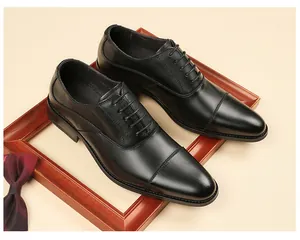 Chaussures Oxford élégantes en cuir noir avec bout rapporté pour tenue formelle professionnelle