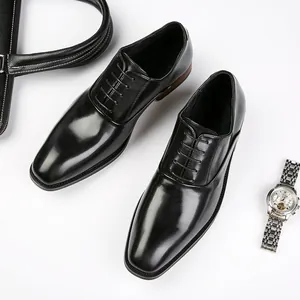 Premium men's black leather Oxford dress shoes featuring a classic wood-tone heel.
