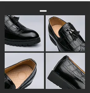Détails de mocassins à pampilles noirs avec motif crocodile et perforations brogue