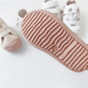 Close-up of non-slip soft sole on toddler bear canvas shoes