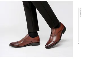 Men's brown leather oxford shoes with cap toe design, perfect for formal business wear