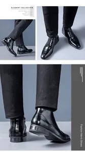 Detailed view of men's black leather Chelsea boots with side zipper and laces.
