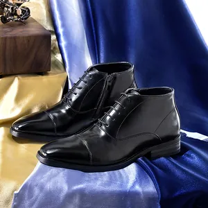Premium black leather men's dress boots with side zipper and formal cap toe design.
