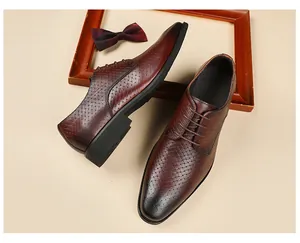 Close-up of men's embossed leather Derby shoes in brown with business formal style
