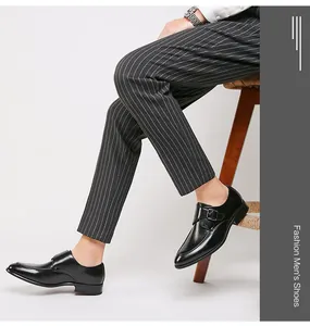 Detailed side view of black leather monk strap dress shoes for men's business wear