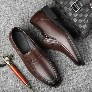 Classic men's brown leather business dress loafers featuring a slip-on design and metallic accents.