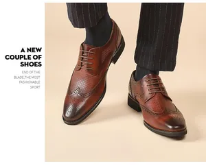 Detail view of premium brown leather brogue shoes with hand-carved wingtip patterns