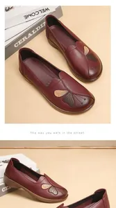 Detailed view of burgundy soft leather flat shoes for elderly women's daily comfort