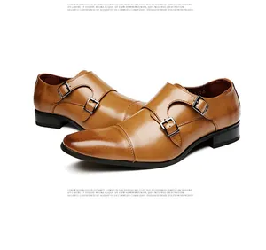 Detailed view of men's tan leather double monk strap shoes for formal business attire