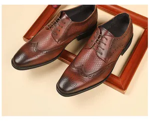 Close-up view of premium brown leather Brogue shoes with intricate wingtip carving detail
