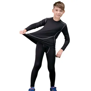 Boys black quick-dry athletic compression suit set for soccer and running training