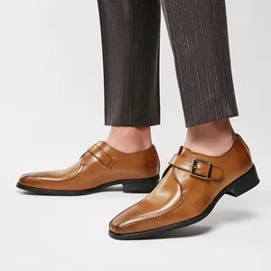 Elegant men's tan leather monk strap shoes with pointed toe for business formal wear