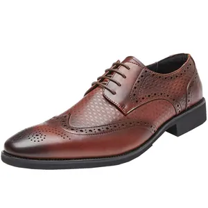 Detailed view of brown leather brogue derby shoe with exquisite wingtip carvings