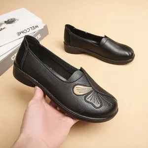 Comfortable black leather flat shoes for elderly women with butterfly embroidery