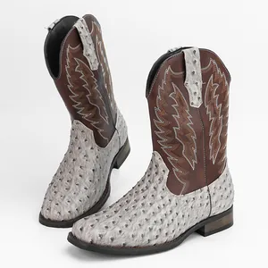 Bottes de cow-boy Western pour hommes avec bout carré et texture peau d'autruche.