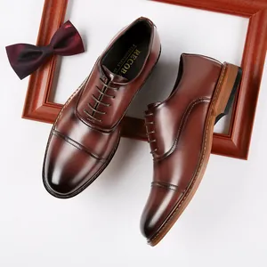 Elegant brown leather cap-toe oxford shoes for men's business or wedding