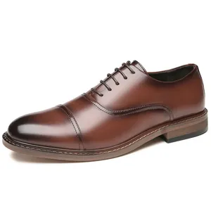 Elegant men's brown leather cap-toe oxford shoes for business formal occasions