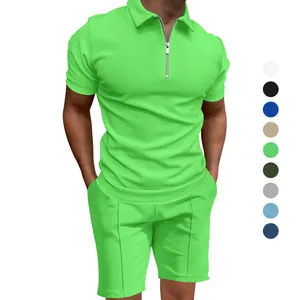 Completo uomo polo e pantaloncini in maglia a nido d'ape verde lime con vari colori.