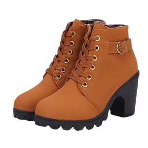 Brown lace-up Martin boots with chunky high heel and platform sole for women