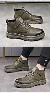 Detailed view of men's olive brown mid-top leather Martin boots with rugged lug soles