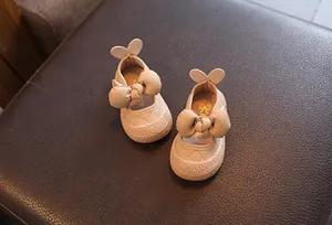 Chaussures de marche pour bébé fille en cuir beige avec nœud et oreilles de lapin