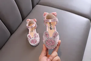 Elegant pink girl's princess dress shoes with sparkly rhinestone rabbit design for stage