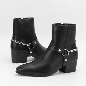 Detailed shot of black men's high heel boots featuring silver chain and metal hardware