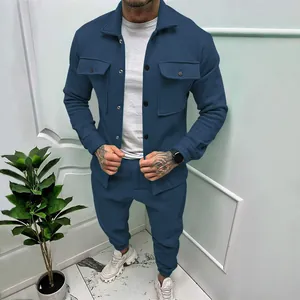 Detail of men's slim fit suede two-piece set with single-breasted jacket and joggers