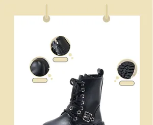 Detailed view of children's black Martin boots with side zipper and floral eyelets