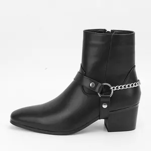 Close-up side view of men's black fashion boot with silver chain and metal ring detail