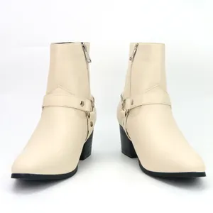 Elegant men's beige heeled boots with decorative side chains and straps detail