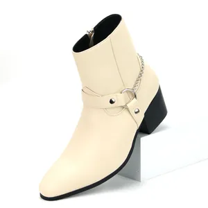 Side view detail of men's cream fashion boots with silver chain and black block heel