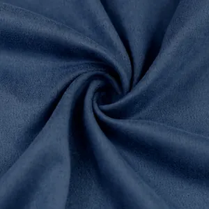 Detailed macro view of high-quality navy blue suede fabric texture for men's autumn jackets