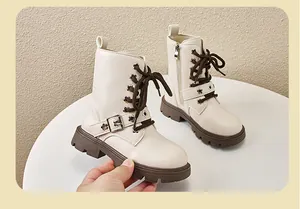 Cream children's Martin boots with brown laces and functional side zipper closure detail