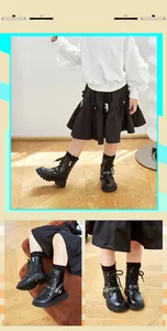 Detailed view of children's black Martin boots with lace-up and side zipper design