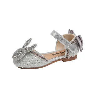 Sparkly silver girls princess shoes featuring a cute rabbit ear design for dance