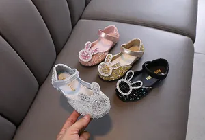 Detail view of girls' rhinestone princess shoes with cute rabbit ears in four colors