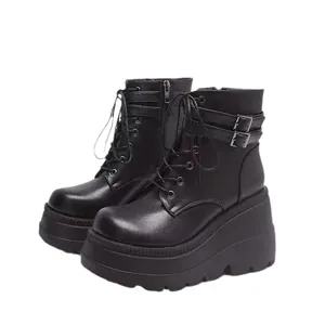 Gothic black faux leather platform boots with thick wedge soles and buckle straps