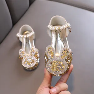 Elegant sparkly girls princess shoes with cute rabbit rhinestone design and pearl ankle strap