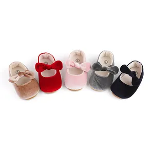 Detailed view of baby velvet princess shoes in five different colors with bows