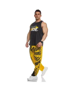 Detailed close-up of men's yellow quick-dry joggers featuring bold black graffiti print