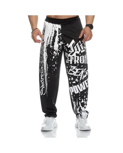 Detail of men's quick-dry fitness joggers featuring bold STRONG and BEAST graphic prints.