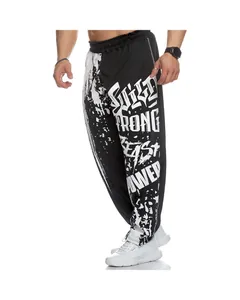 Detailed view of men's loose graphic print workout sweatpants in black and white